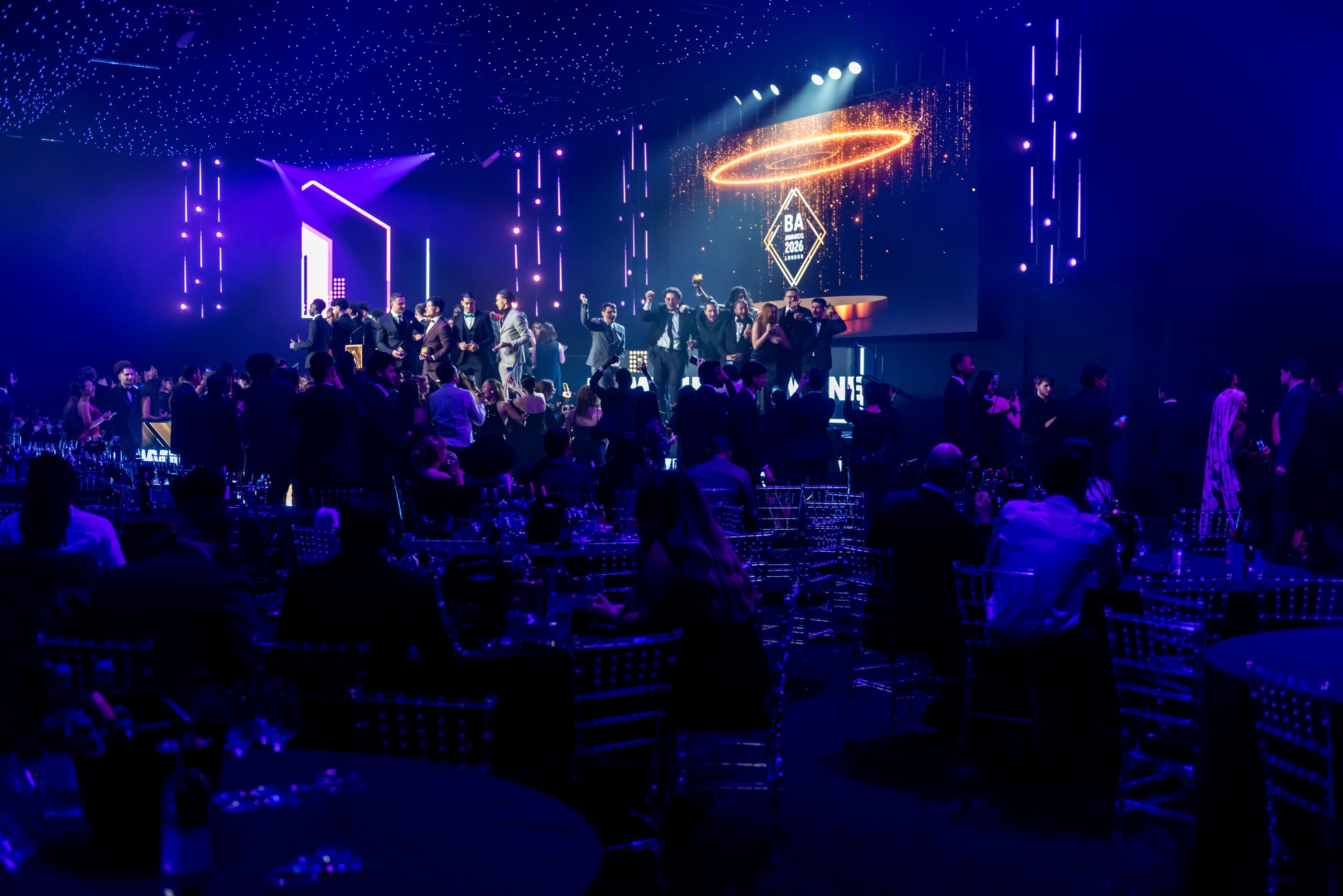 FM Awards audience in a purple-lit conference venue
